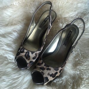 Leopard skin, open toed heels.